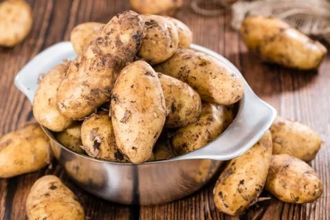 Heap of freh potatoes Stock Photos