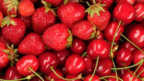 Heap of fresh cherry and strawberry close up, rotation Stock Footage 340190160