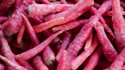 Heap of fresh red root vegetables Stock Footage 338167909