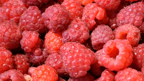 Heap of  fresh tasty raspberry as textured background, top view, rotation, cl Video stock 134370690