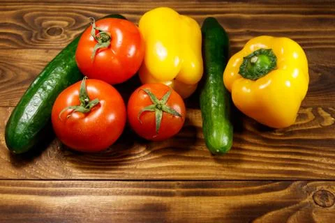 Heap of fresh vegetables on the kitchen table Stock Photos