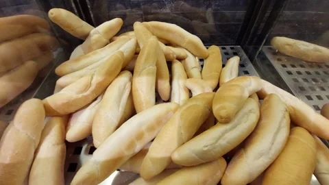 Heap of Freshly Baked White Bread Rolls in Supermarket Stock Footage 333643982