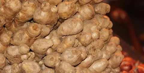 Heap of ginger close up view in a local market Stock Photos