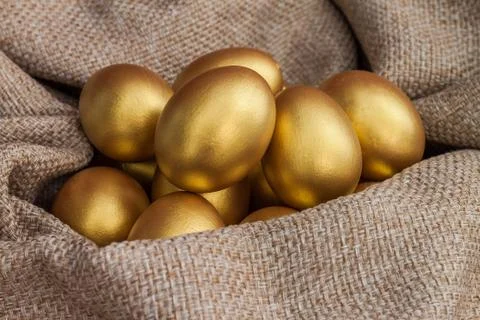 Heap of golden easter egg Stock Photos