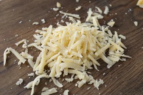 Heap of grated parmesan Photos