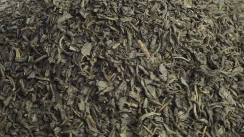 Heap of Green Tea on black Background - Turn around Animation Stock Footage 271621888