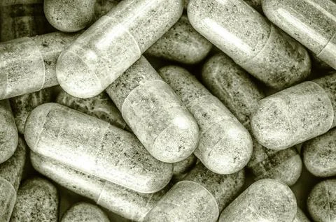Heap of herb capsules Stock Photos