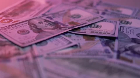 Heap of hundred dollars, throwing banknotes on the table Stock Footage 137917152