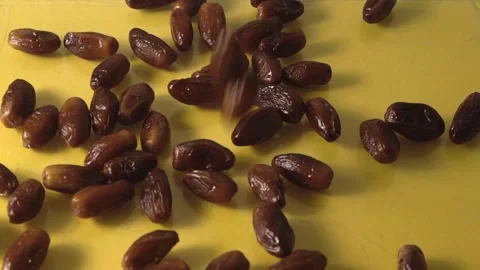 Heap of Juicy Dates with Falling Dates from Above Slow Motion Capture 1 Video stock 304186088