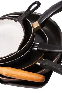 Heap of kitchen bakeware with pan and pot Stock Photos