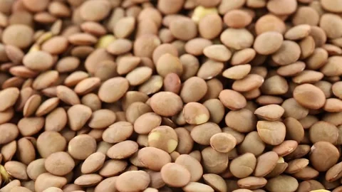 Heap of lentils rotating close up macro view, source of plant-based protein a Stock Footage 155022031