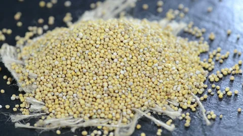Heap of mustard seeds (loopable) Stock Footage 37947688