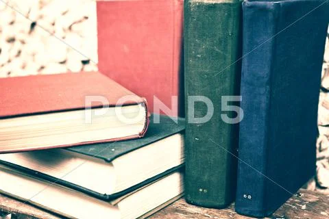 Heap of old books, close-up Stock Photos