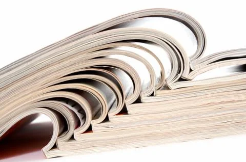 Heap of open magazines Stock Photos