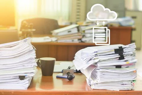 Heap of papers work stack documents on office desk Stock Photos