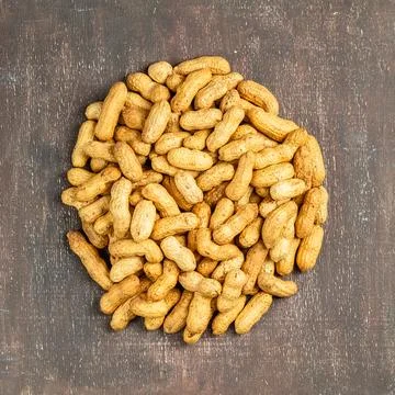 Heap of the peanuts with the shell top view Stock Photos