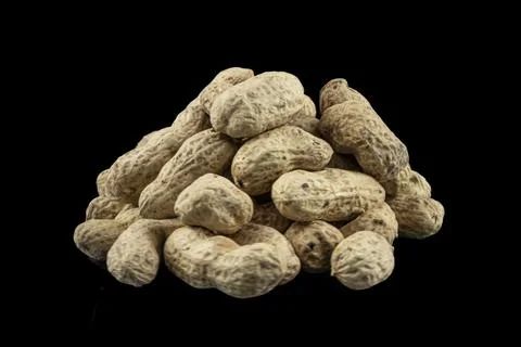 Heap Peanuts in shells isolated on black background 写真素材