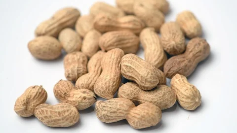 Heap of peanuts on white background Stock Footage 113072776