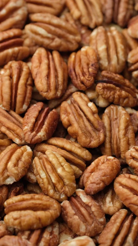 Heap of pecan nuts close up, rotation. Healthy food concept Video stock 277479120