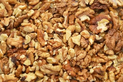 Heap of peeled walnut kernels Stock Photos