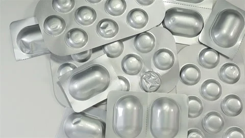 Heap of pills in blisters close-up Stock Footage 143423491