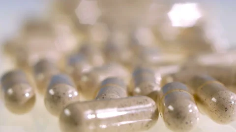 Heap of pills in macro shot with nice bokeh Video stock 65940128