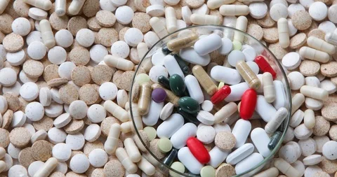 Heap of pills. Top view, flat lay	 Stock Footage 126807688