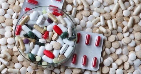 Heap of pills. Top view, flat lay	 Stock Footage 126807707