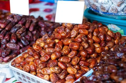 Heap of pitted dates isolated as background, top view Foto stock