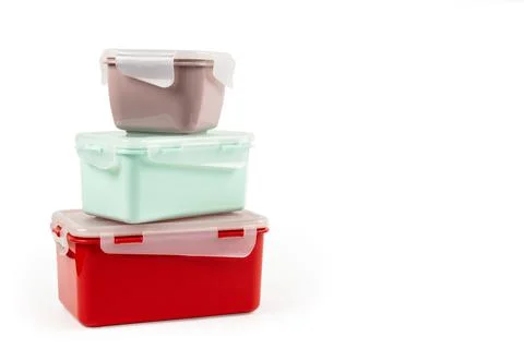 Heap of plastic multi-colored containers of different sizes for food Stock Photos
