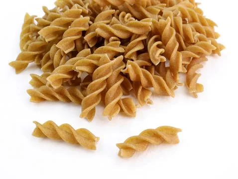Heap of raw dry eggless rye fusilli. Stock-Fotos