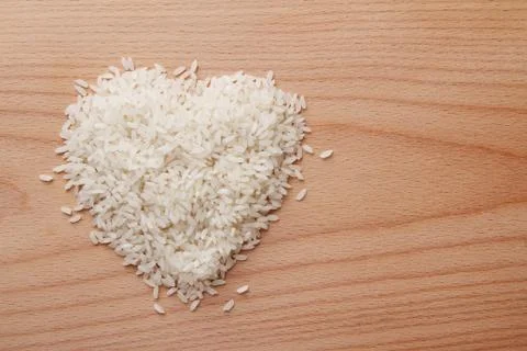 Heap of raw rice Stock Photos