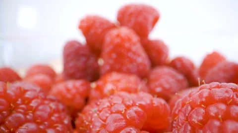 A heap of red raspberry fruit on the basket Stock Footage 135699170