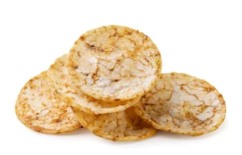 Heap rice chips close-up on white. Isolated Stock Photos