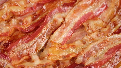 Heap of Roasted Bacon Slices, slider shot. Traditional breakfast with bacon Video stock 248951237