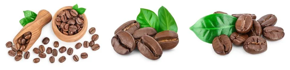 Heap of roasted coffee beans with leaves isolated on white background . Set or Stock Photos