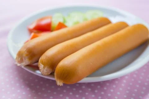 Heap of sausages on a table Foto stock