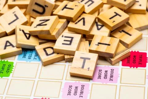 Heap of scrabble tile letters from above Stock Photos