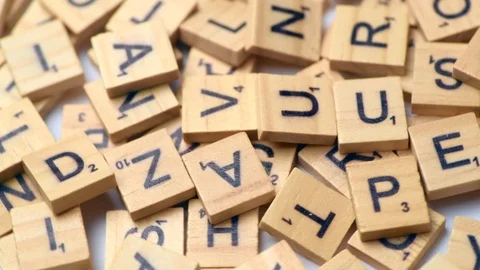 Heap of scrabble tiles rotating Stock Footage 113112781