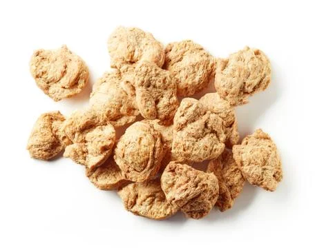 Heap of soya chunks isolated on white, from above Stock Photos