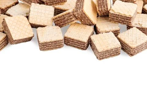 Heap square wafer biscuits isolated on white background Stock Photos