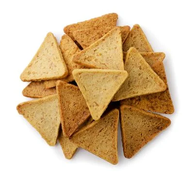 Heap of triangular chips, hummus snack close-up on a white. Top view Stock Photos