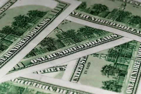 Heap of US dollars banknotes lying chaotically Stock Photos