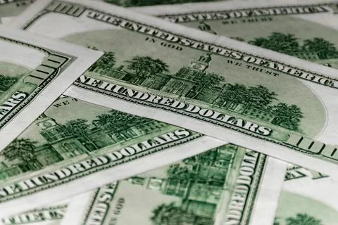 Heap of US dollars banknotes lying chaotically Stock Photos