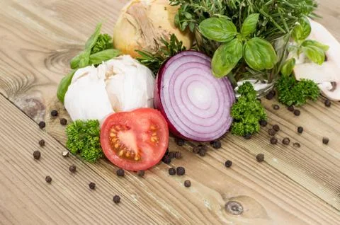 Heap of vegetables with herbs Stock Photos