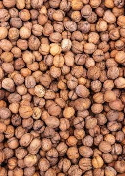 Heap of Walnuts for background texture, close-up, top view, copy space for te Stock Photos