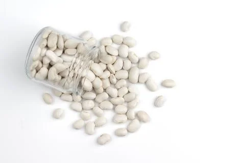 Heap of white beans on white background, top view Stock Photos