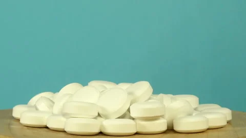 Heap of white pills close up Stock Footage 140687160