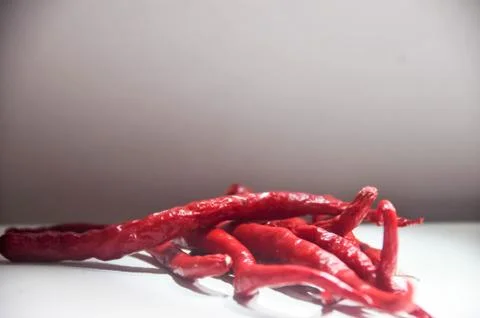 Heaps of red chilies Stock Photos