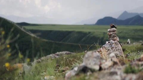 Heaps of stone on a background of mountains Stock Footage 137228049